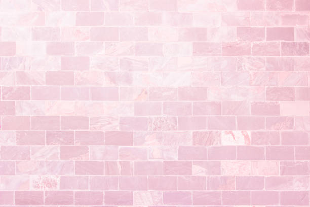 Empty Pink brick wall texture background in the bedroom at lovely. Brickwork stonework interior, rock old clean concrete grid uneven abstract weathered brick design, horizontal architecture wallpaper.