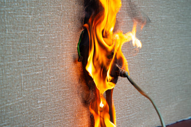 istock Fire of electrical wiring and electrical outlets. Faulty electrical wiring causes fires. 1474919886