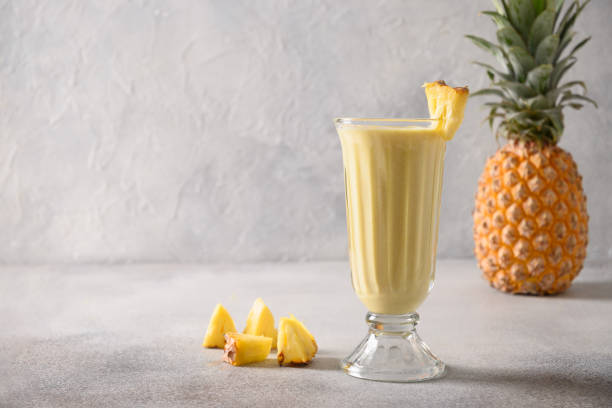 istock Indian mango or turmeric lassi on gray background 1474919938