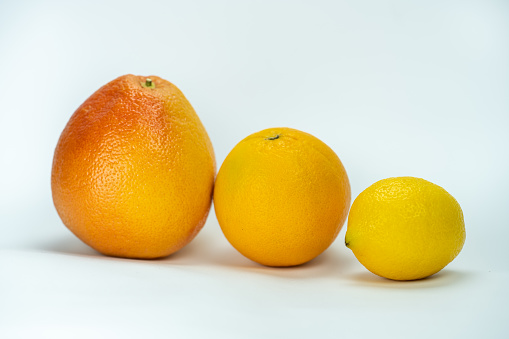 Grapefruit, orange and lemon
