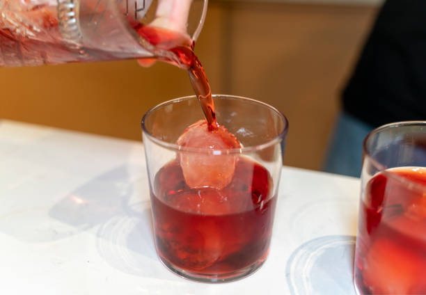 istock Barmen pouring cocktail 1474929742