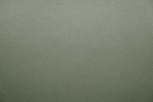 Pale gray brown green abstract background with space for design. Sage green shade of color. Rough fabric texture. Vintage. Matte. Template. Empty.