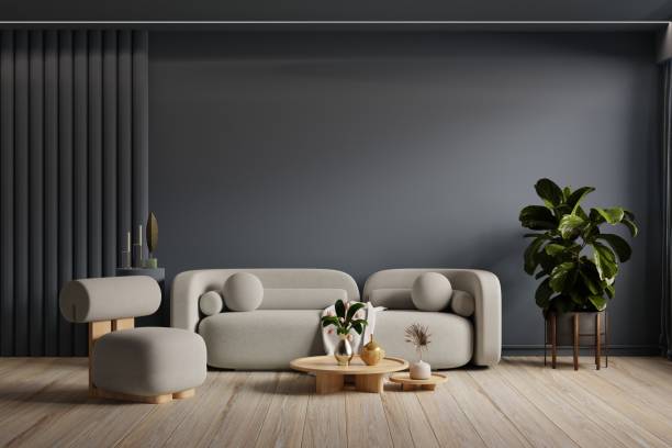 istock Mockup living room interior with sofa and armchair on empty dark blue wall background. 1474938509