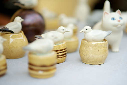 Ceramic dishes, tableware and jugs sold on Easter market in Vilnius. Lithuanian capital's annual traditional crafts fair is held every March on Old Town streets.
