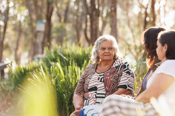 Multi-generational indigenous Australian family, three generations of Aboriginal Australian women stock photo