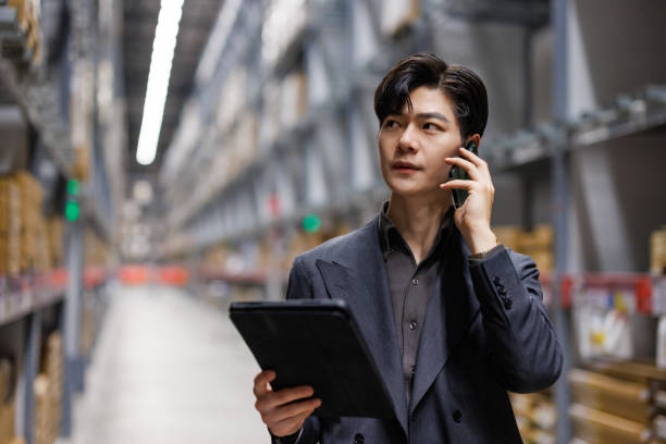 istock Portrait of successful manager at warehouse. 1474949518