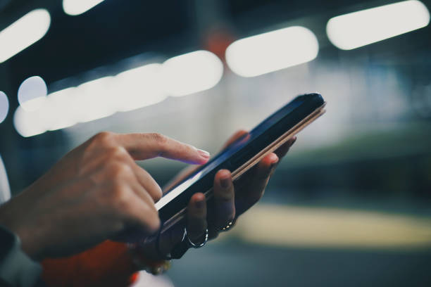 istock Human hands when holding a smartphone 1474959258