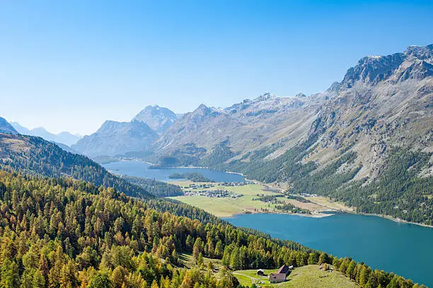 Aerial view on the Corvatsch hiking resort with Lake Silvaplana and Lake Sils, near St Moritz.