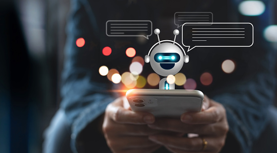 Digital chatbot, A.I., robot application, conversation assistant, AI Artificial Intelligence concept. Woman using mobile smart phone chatting with digital chatbot customer service