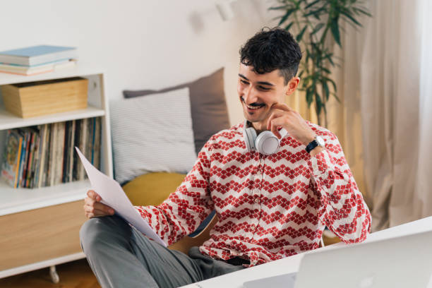 istock young man remote working from his home 1474964374
