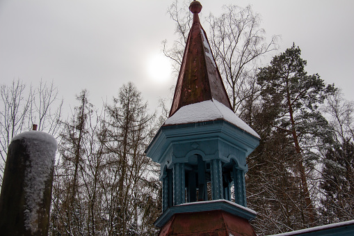 Little clock tower after several days heavy snowing. Captured in the canton of Glarus during winter season.