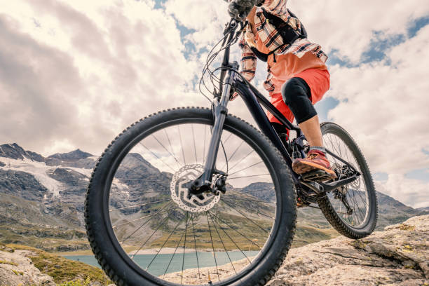 istock Unrecognisable mountain biker on rocky trail 1474971994
