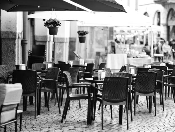 istock tables of a bar under a colonnade 1474974730