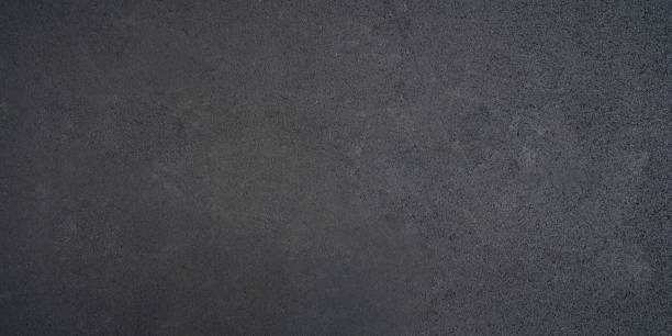 istock Top view background texture of rough asphalt 1474977111
