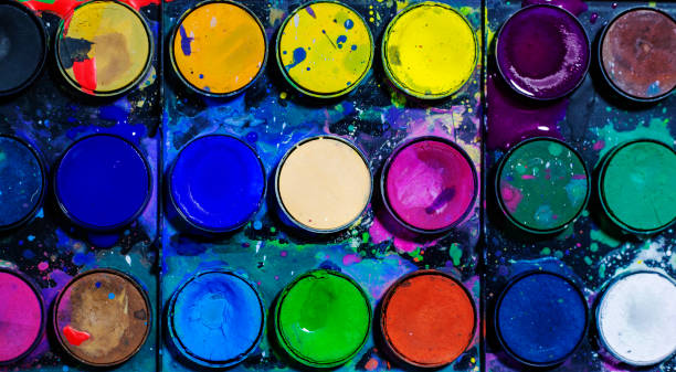 istock Watercolor multicolored paints close up, top view 1474977748