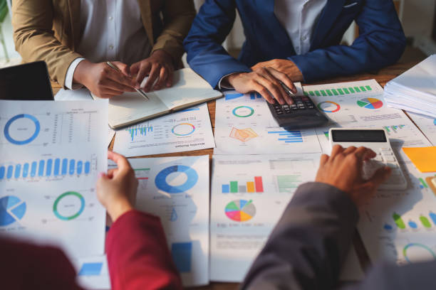 istock Business team working with financial document at office. analysis, discussion and brainstorming, business strategy 1474982100