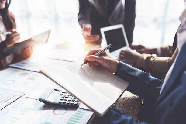 istock Business team working with financial document at office. analysis, discussion and brainstorming, business strategy 1474982736