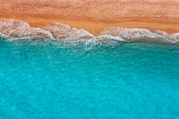 istock Top view of the surf line on the sandy beach 1474983462