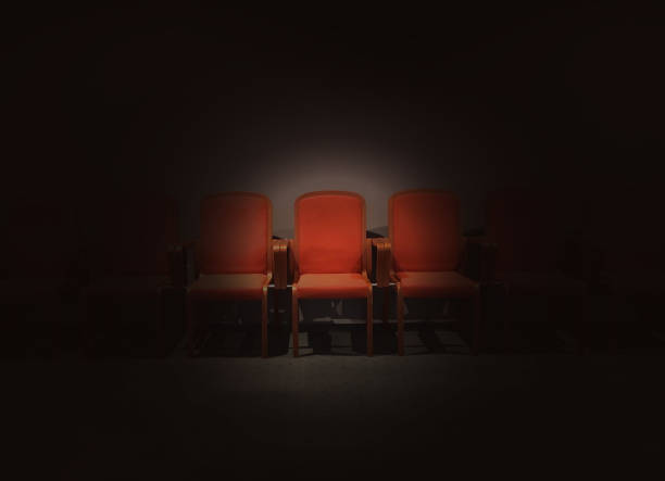 Red seats floating in the spotlight