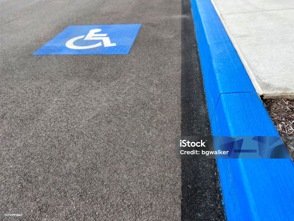 Handicapped Parking Space ADA Handicapped disabled parking space Americans with Disabilities Act Stock Photo