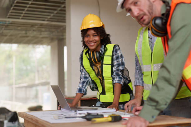 istock American African Foreman builder woman at construction site. Foreman construction and Engineer working at construction site 1474992274