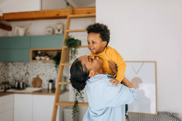 istock Mother and cute little boy bonding at home 1474992279