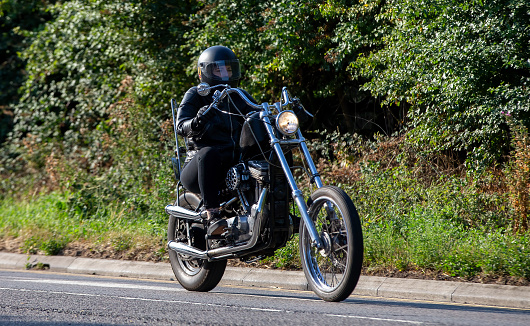 Potterspury,Northants, UK - August 14th 2022. 1997 Harley Davidson classic motorcycle on an English country road