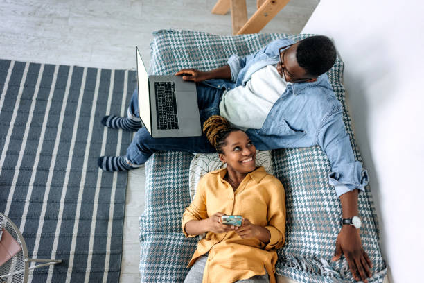 istock Couple relaxing at home 1474998626