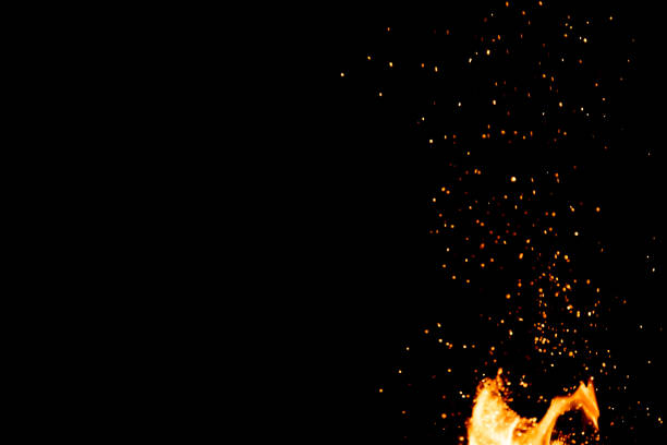 istock Splash of fire with glowing particles 1474998822