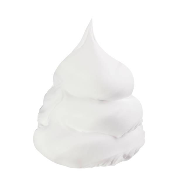 istock Whipped cream isolated on white background 1474999752