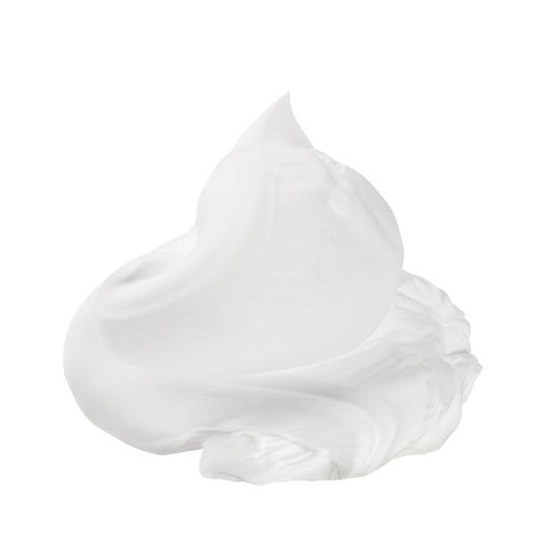 istock Whipped cream isolated on white background 1474999777