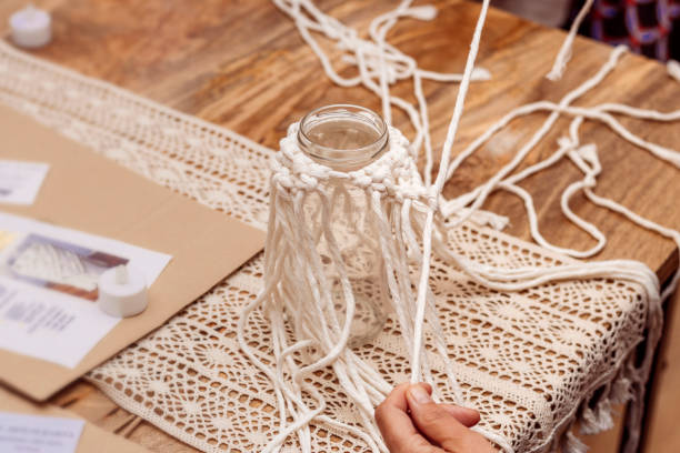 istock White macrame. Close-up of a macrame knot. 1475001824
