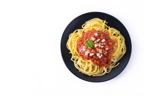 istock Spaghetti with bolognese sauce isolated on white background 1475003231