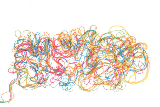 istock Tangled colorful cotton threads isolated on white background. 1475003633