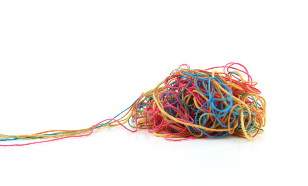 istock Tangled colorful cotton threads isolated on white background. 1475003653