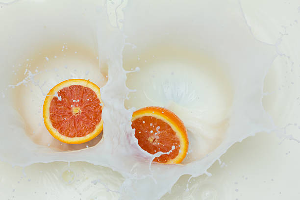 Orange and splashing milk
