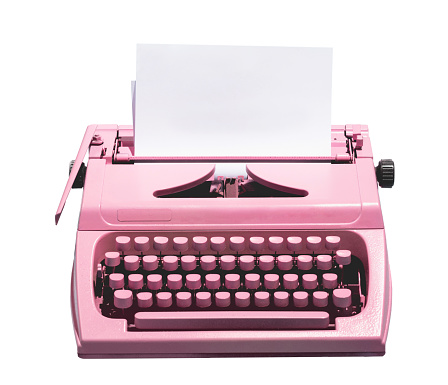 Retro pink typewriter with empty page. Isolated on white.
