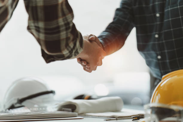 istock Foreman or Civil engineer handshake making modern construction. industry professional team and engineer concept 1475011450
