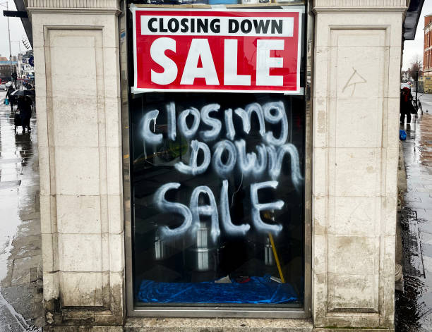 Closing down sale Shop closing on a busy high street in Ilford closing down sale stock pictures, royalty-free photos & images