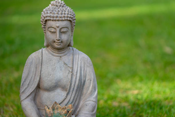 istock buddha statue in the garden 1475015916