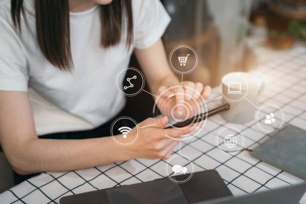 istock Hand women using smart phone and laptop, social media. 1475016815