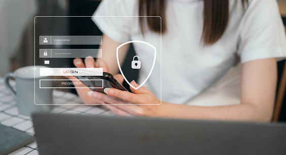 woman typing login and password in the concept of cyber security, information security, data protection, and encryption for secure access to user's personal information.