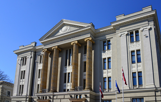 Riga, Latvia: Ministry of Foreign Affairs of Latvia headquarters - neoclassical façade with Ionic tetrastyle portico, completed in 1913 to a design by August Vite  on Riga's main street, Krisjana Valdemara Iela (formerly named after Gorky, Herman Göring and tzar Nicholas II). Frieze bearing a quotation from Gaius Sallustius Crispus \