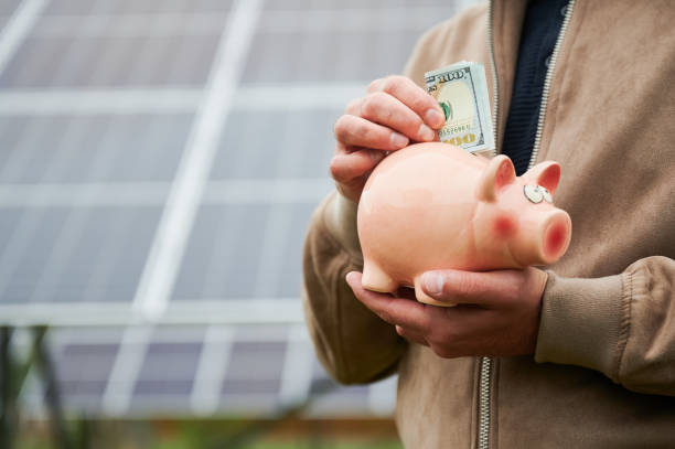 istock Man investing in ecological energy sources. 1475018383