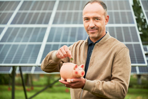 istock Young man making investment in alternative ecological resources. 1475018393