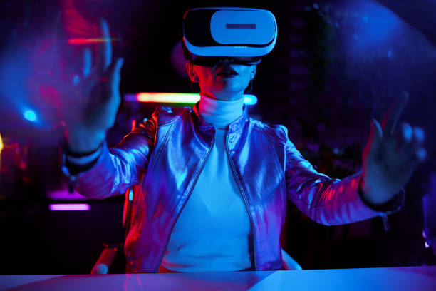 istock modern woman in virtual reality goggles in modern office 1475023874
