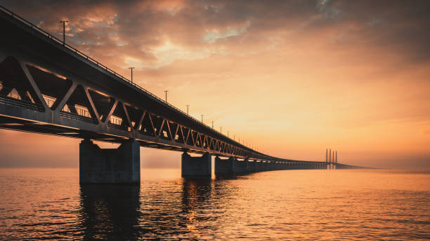The Oresund Bridge is a combined motorway and railway bridge between Sweden and Denmark (Malmo and Copenhagen). The Oresund Bridge is a combined motorway and railway bridge between Sweden and Denmark (Malmo and Copenhagen). oresund bridge stock pictures, royalty-free photos & images