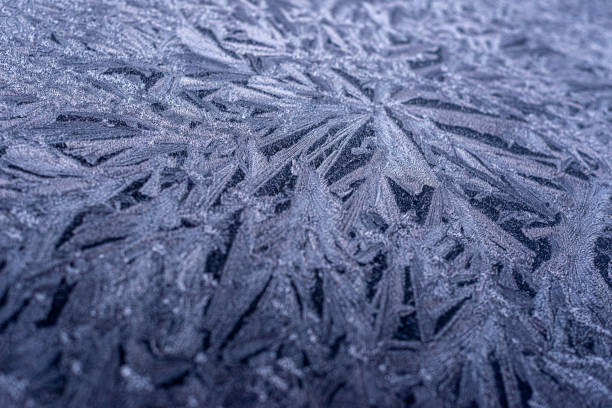 istock Black Car frozen over in winter 1475028515