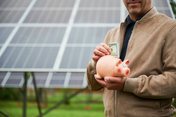 istock Man investing in ecological energy sources. 1475028691