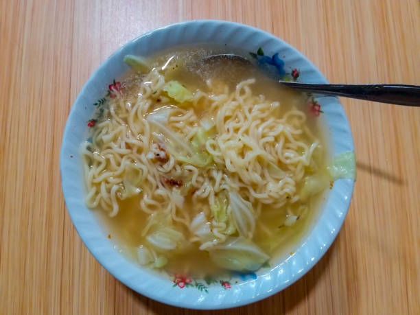 istock noodle soup with cauliflower on background strip 1475030184